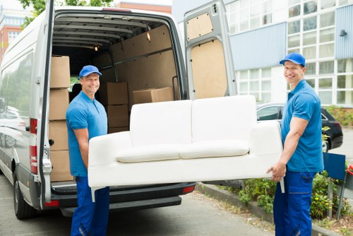 Storage pricing discussion with move-ready boxes and furniture