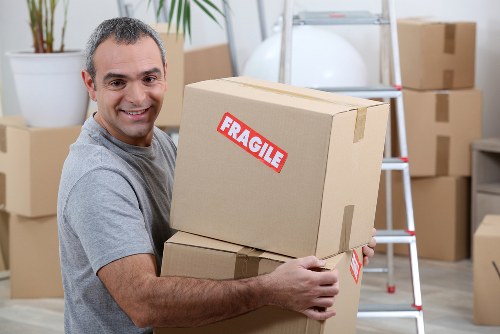 Packed moving boxes and labels prepared for relocation