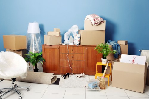 Small removals van loading furniture in Camberwell